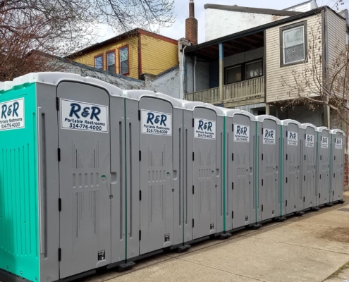 Portable toilets on side of street